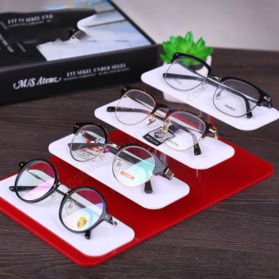 China Modern Custom High Quality Red Acrylic Eyeglass Tray Optical MDF Shop Display Stand Wall Mounted Sunglasses Show Rack Eyewear Tray for sale