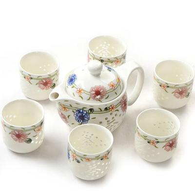 China Exquisite Stored Blue And White Tea Set Hollow Porcelain Cup Kung Fu Ceramic Tea Set for sale