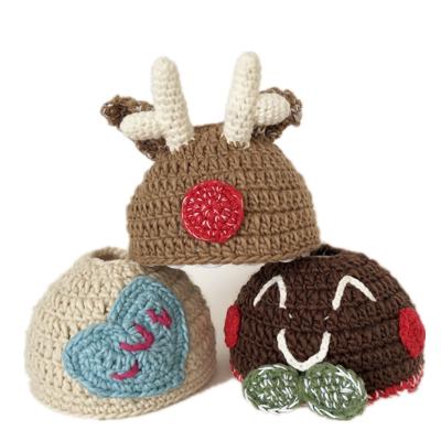 China COMMON Winter Knit Beanie Hat Kids Thick Slouchy Snow Hats Toddler Smile Face Warm Knitted Ponytail Knit Beanies for sale