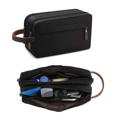 中国 Men's Travel Toiletry Organizer Bag Water-Resistant Shaving Dopp Kit Bathroom Bag Canvas Travel Washing Storage Bag 販売のため