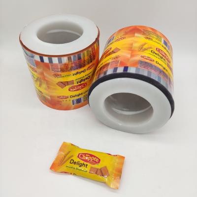 China Custom Transparent Moistureproof Automatic Vertical Wrapping Roll Film Biscuit Food Wrapping Wrapping Film Roll for sale