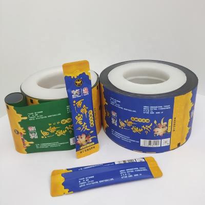 China Moisture-proof custom material laminated film roll printing plastic packaging film roll honey packaging film liquid packaging for sale