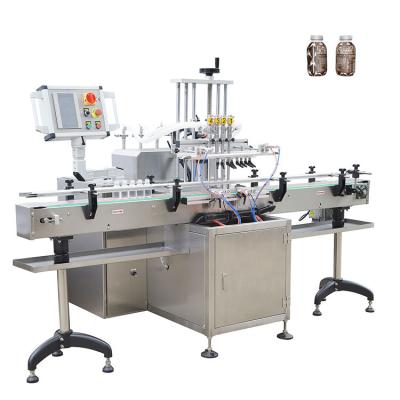 China GARMENT 4 Nozzles 2nd Generation Packaging Machine For Olive Oil Juice Perfume Filling Machine for sale