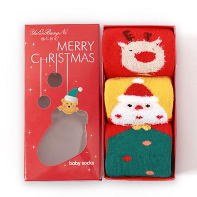 China Antibacterial 3 Pairs Kids Christmas Socks Low MOQ Fuzzy Slipper Socks Winter Warm Cute Gift Socks For Kids for sale