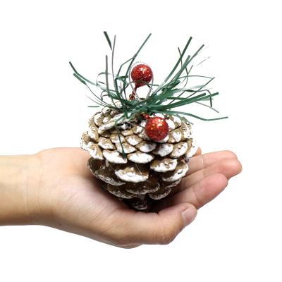 China Handwork Snow Covered Dry Pine Cone Crafts 6 Color Custom Printing For Christmas Decoration for sale