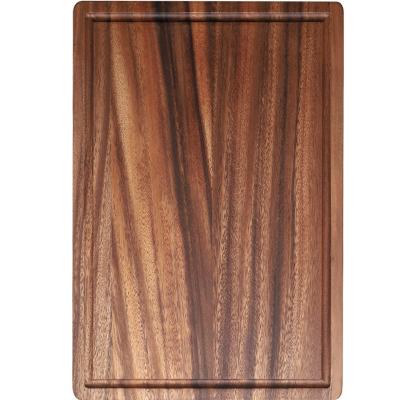 China Sustainable Acacia Wood Cutting Board Solid Wood Slotted Steak Dish Chopper for sale