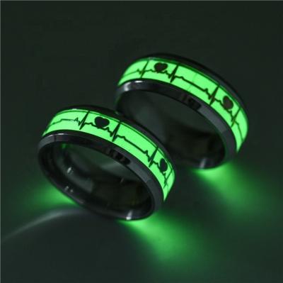 China Environmentally Friendly Dynamic Shapes Luminous Stainless Steel Finger Ring For Women Men Glowing In Dark Heart Couples Wedding Bands Jewelry Gift for sale