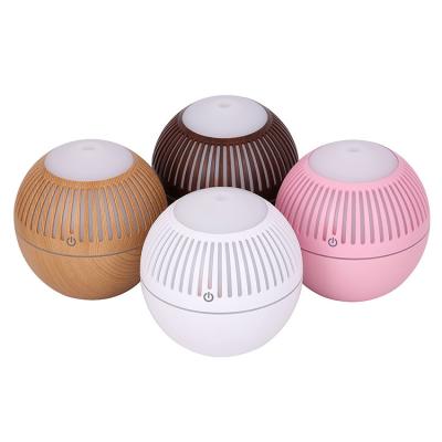 China Size Chart Mini Oil Diffuser Aroma Essential Portable Humidifier with LED Light for sale