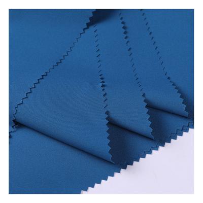 China Breathable Polyester 100 Soft Stretch Fabric Polyester Stretch Fabric Breathable Mechanical Plain Clothing Fabric for sale