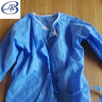 China Breathable Waterproof Disposable PPE Surgical Gown Blue With Knitted Cuff For Hospital for sale