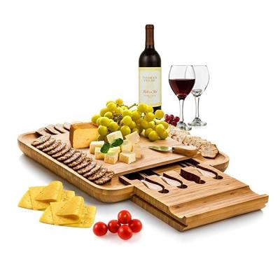 China Disposable Swivel Bamboo Wine Pairing Round Serving Tray Cheese Board And Knife Set For Birthday Gift for sale