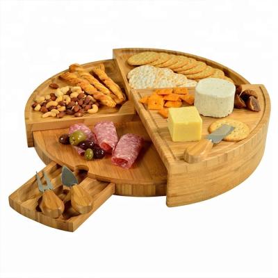 China Disposable Creative Bamboo Totally Round Cheese Board With Holder And Tool Cutlery Set for sale