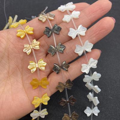 China Play of color or by natural bow tie of fire beautiful and cute mother-of-pearl cut out of BROOM 10x16mm for sale