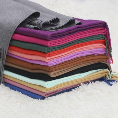 China 2022 Cashmere Low Price Stock Winter Cashmere Wool Scarf Pure Color Scarf With Tassel Scarf for sale