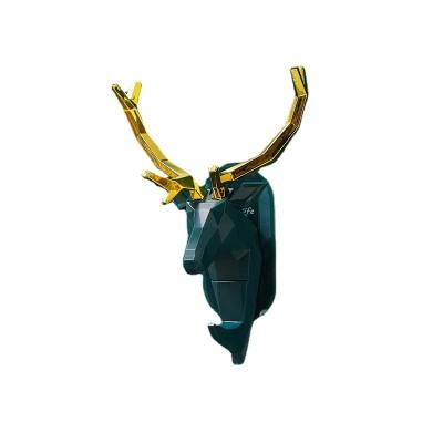 China Creative perforated hook stocked Aoniu light paste wall hanging deer luxury traceless minimalist home decoration for sale