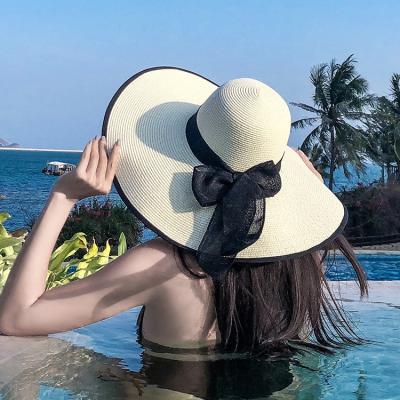 China 2021New Sun Breathable Hats For Women Girls Overflow Soft Ribbon Chapeau Femme Ete Black Straw Hat Summer Bohemia Beach for sale