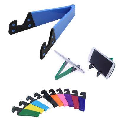 China Custom Printed Promotional V Shape Plastic Foldable Phone Stand Adjustable for sale