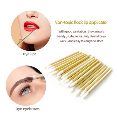 China Popular Wholesale Bamboo Lip Gloss Applicator Magic Wands Sweep Lipstick Applicator Lip Gloss Magic Wands Disposable Lip Brush for sale