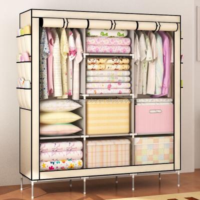 China Wardrobe Huge Size With Side Pockets Nonwoven Fabric Portable Folding Wardrobe for sale