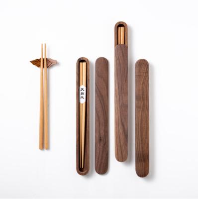 China Custom Travel Viable Laser Logo Portable Bulk Dinnerware Japanese Beech Personal Reusable Wooden Chopsticks With Black Walnut Case for sale