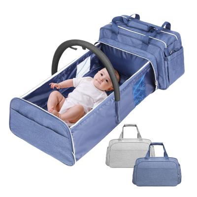 China New Design Water Resistant Baby Bag With Station Baby Sleeping Bag Travel Crib Changing Expandable Diaper Bag for sale