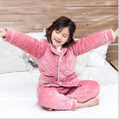 China Breathable Lounge Wear Flannel Sleepwear Kids Winter Solid Color Thicken 2 Piece Pajamas Sets For Boys And Girls for sale