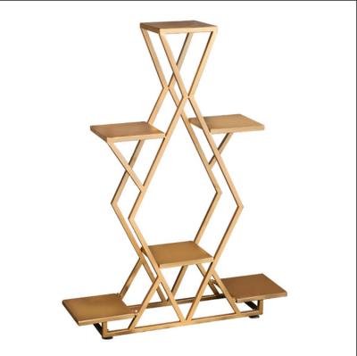 China TMJ-2568 Custom Luxury Shops Window Retail Store Metal Gold Gold Shoes Bag Floor Stand Shelf Display Rack for sale