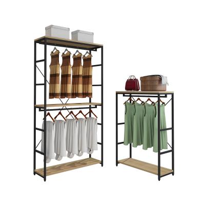 China TMJ-752 customized modern custom design to provide local service fabric store display stand clothes display rack for sale