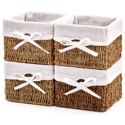 China Natural Woven Wicker Shelf Organizer Sustainable Set Of 4 Plant Plankton Storage Nest Baskets for sale