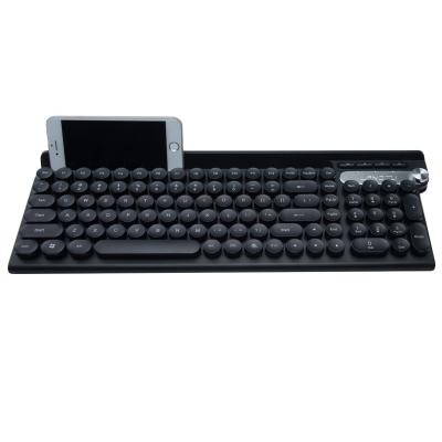 China Fashionable Waterproof Slient 2.4G Wireless Keyboard Mouse Desktop Multimedia Combo Punk Key Top with Mobile Phone Holder for sale