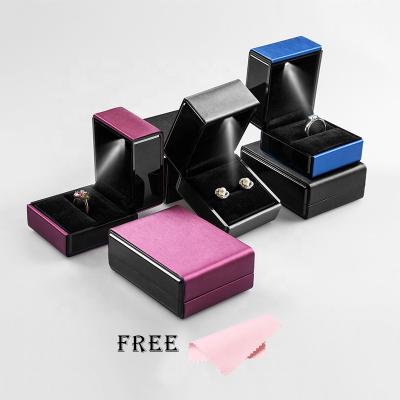 China Custom Jewellry Logo Ring Necklace Bangle Watch Jewelery Packaging Case PU Leather LED Light Up Jewelry Display Gift Box Packaging For Wedding for sale