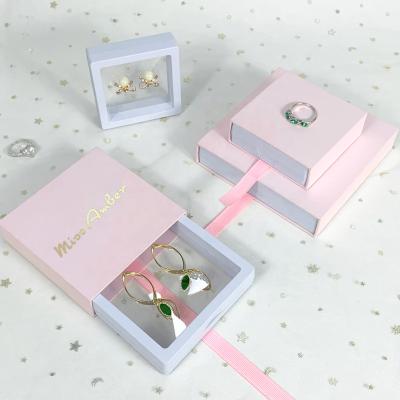 China Jewelry Packaging Custom Logo Cardboard Sliding Sleeve Paper Jewelry Storage Drawer Box Packaging With PE Clear Film Floating Gift Display Box for sale