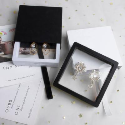 China Jewelry Packaging Custom Logo Cardboard Sliding Sleeve Paper Jewelry Drawer Box Packaging With Clear PE Film Floating Gift Display Box With Ribbon for sale