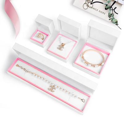 China Custom Leather Filled Paper Packaging White-Pink Luxury Elegant Velvet Jewelry Box Packaging Jewellry Logo Ring Necklace Pendant Chain Bracelet for sale