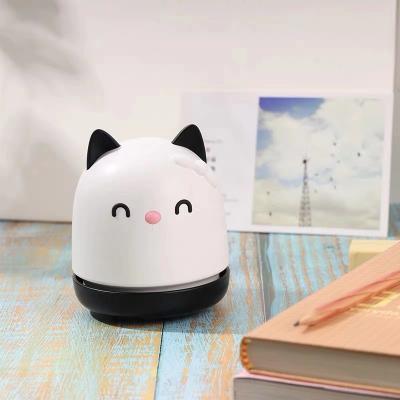 China Household Usb Charge One Button Electric Cute Mini Desktop Vacuum Cleaner Cat Handheld Vacuum Cleaner for sale