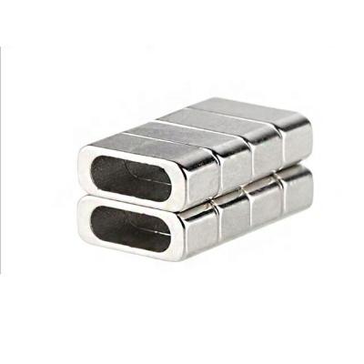 China Custom Industrial Magnet Special Shaped Magnet Strong Magnetic Data Line for sale