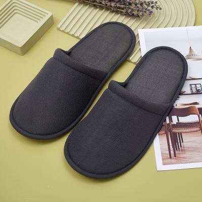 China Exquisite Disposable Hotel Amenities Hotel eco bathroom supplies customized logo closed toe grey hotel disposable slippers for sale