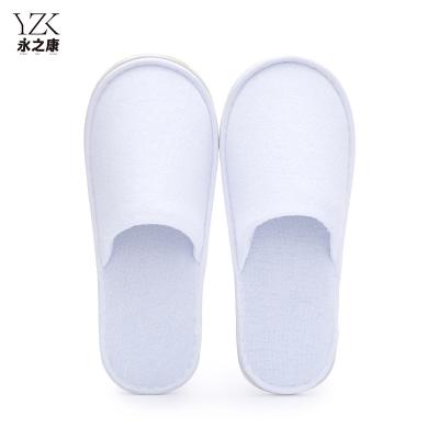 China Exquisite Disposable Hotel Amenities Hotel supplies customized logo closed toe disposable slippers for hotel for sale