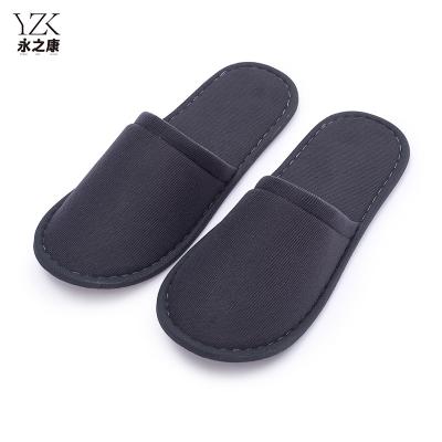 China Exquisite Disposable Hotel Amenities Wholesale Thick Non-slip Guest Room Supplies Dark Grey Disposable Hotel Spa Slippers for sale