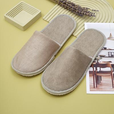 China Exquisite Disposable Hotel Amenities Personalized Terry Cloth Hotel Room Slippers OEM Custom Logo Spa Travel Disposable Guest Slippers for sale