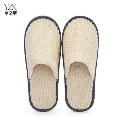 China Exquisite Disposable Hotel Amenities Luxury High Quality Disposable Personalized Stripe Coral Fleece Hotel Bedroom Slippers with Logo for sale