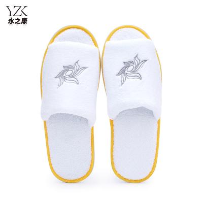 China Exquisite Disposable Hotel Amenities eco-friendly premium high quality high end open toe coral fleece soft hotel slippers with logo for sale