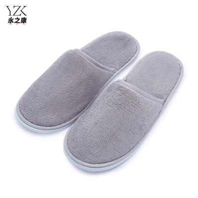 China Exquisite Disposable Hotel Amenities Factory Customized Size Logo Closed Toe Comfortable Grey Coral Fleece EVA Sole Disposable Hotel Bedroom Slippers for sale