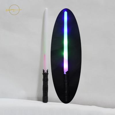 China Pequeño juguete plástico colorido de la espada del relámpago con el interruptor del tacto del sonido 6 LED en venta