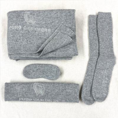 China Hot Sale Cashmere Travel Blanket Knitted Folded Cashmere Travel Set Eye Mask Cover Socks Bag Luxury Gift for sale