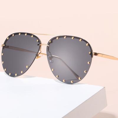 China Around 2021 Retro Steampunk Sunglasses Men Round Rivet Sun Glass Female Eyewear Shades UV400 for sale