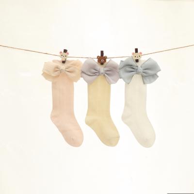 China Antibacterial Cute Baby Bow Socks Lace Up Knee High Tube Sock for sale