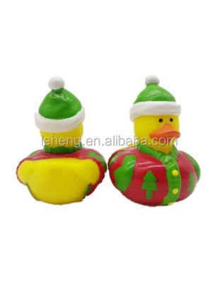 China Christmas Eco-friendly Material Rubber Duck With Painted Pine Spray Water Baby Bath Toy for sale