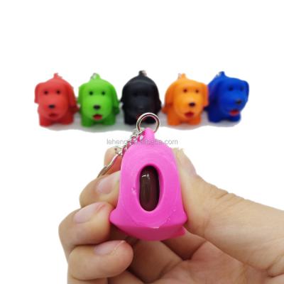 China Compression Poop Shit Promotional Soft Vinyl Compression Poop Poop Dog Shaped To Play Key Chain for sale