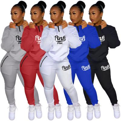 China Autumn QUICK DRY Winter Tracksuits Two Piece Set Pink Letter Print Solid Casual Outfits Zipper Sweatshirt + Pockets Sweat Pants Set Women Suit for sale